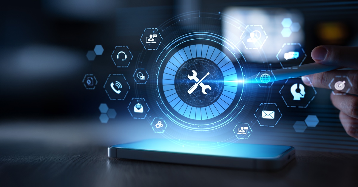 A hand interacts with a glowing digital interface displaying tools and support icons above a smartphone.